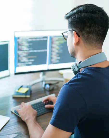 A man typing on keyboard